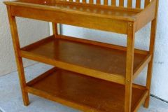 Wood changing table with shelves